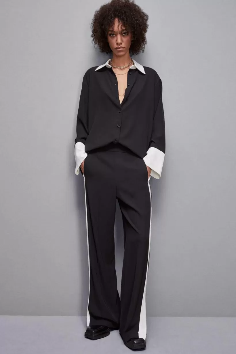 elegancka_tunika_z_dugim_rkawem_5.webp Elegancka tunika z długim rękawem^Patrizia Pepe Store