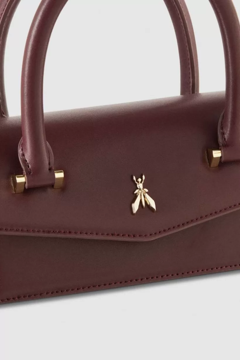 Skórzana torebka na ramię Fly Bamby ze skórzanymi uchwytami^Patrizia Pepe Sale