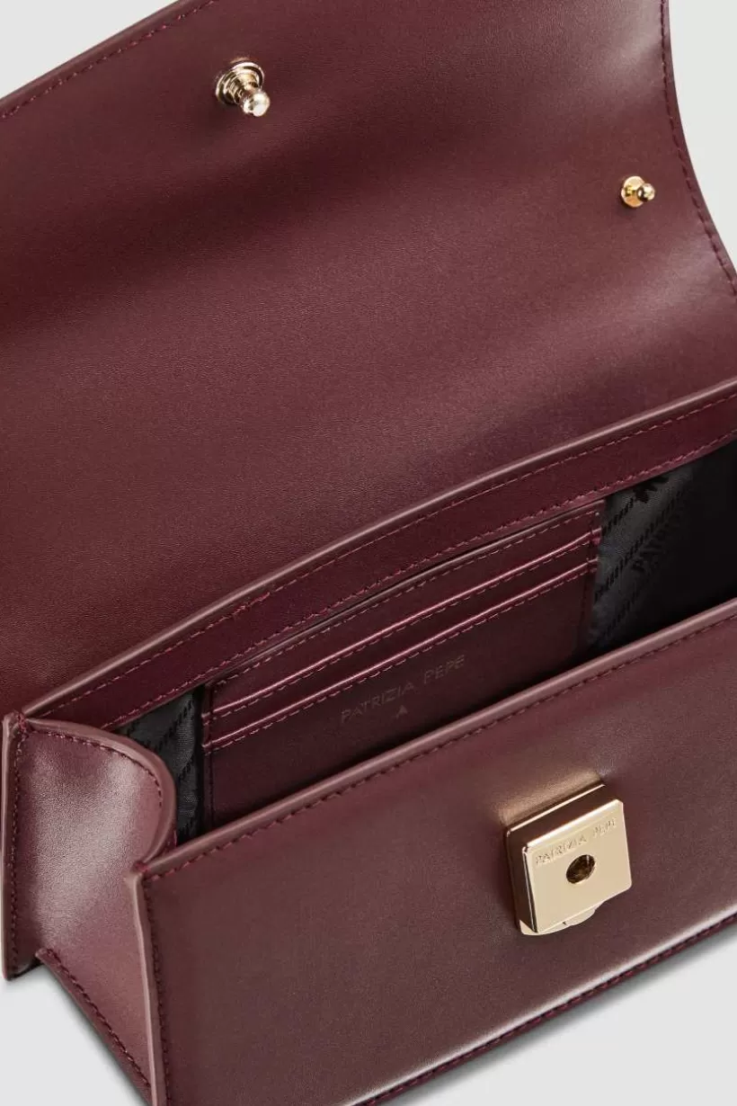 Skórzana torebka na ramię Fly Bamby ze skórzanymi uchwytami^Patrizia Pepe Sale