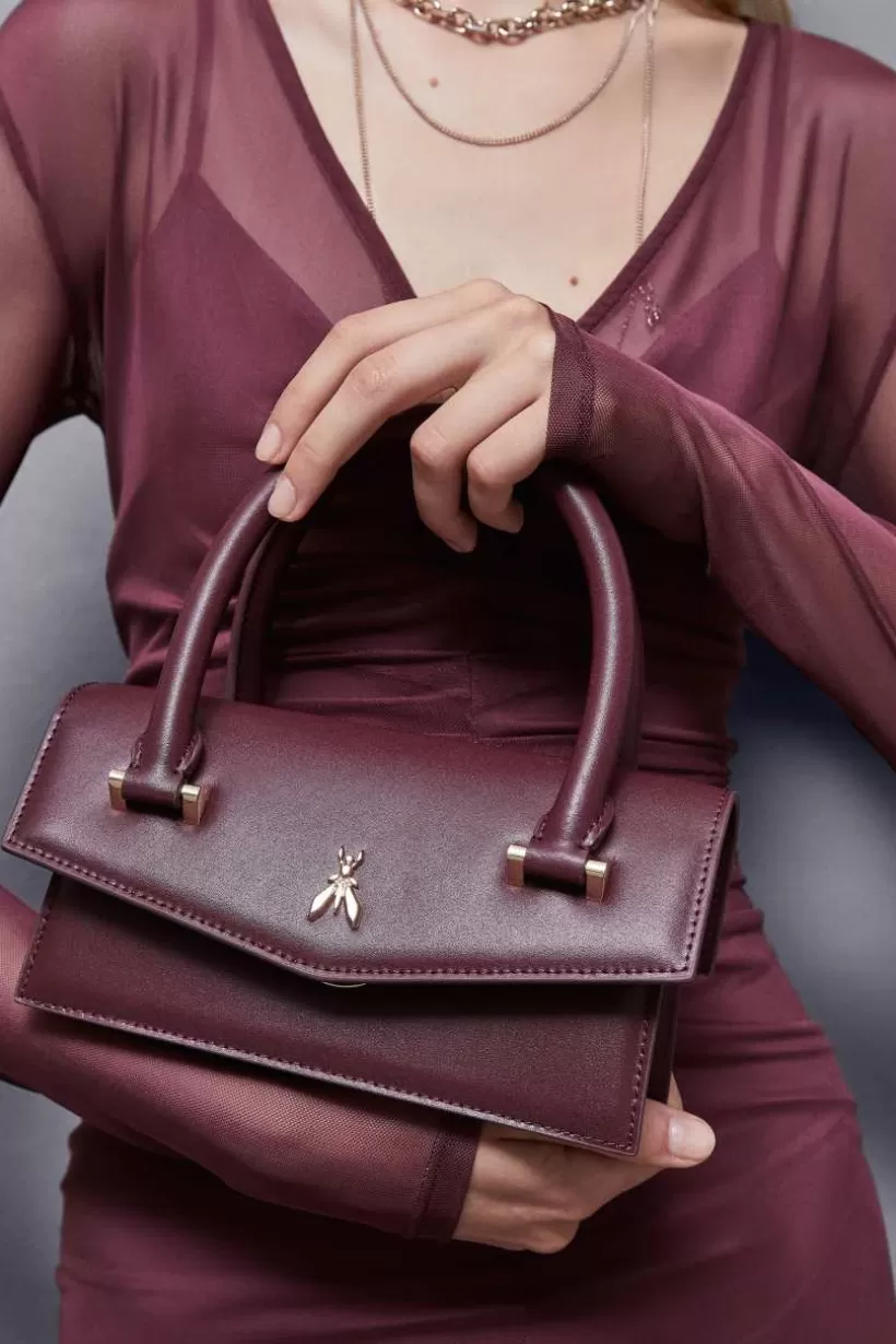 Skórzana torebka na ramię Fly Bamby ze skórzanymi uchwytami^Patrizia Pepe Sale